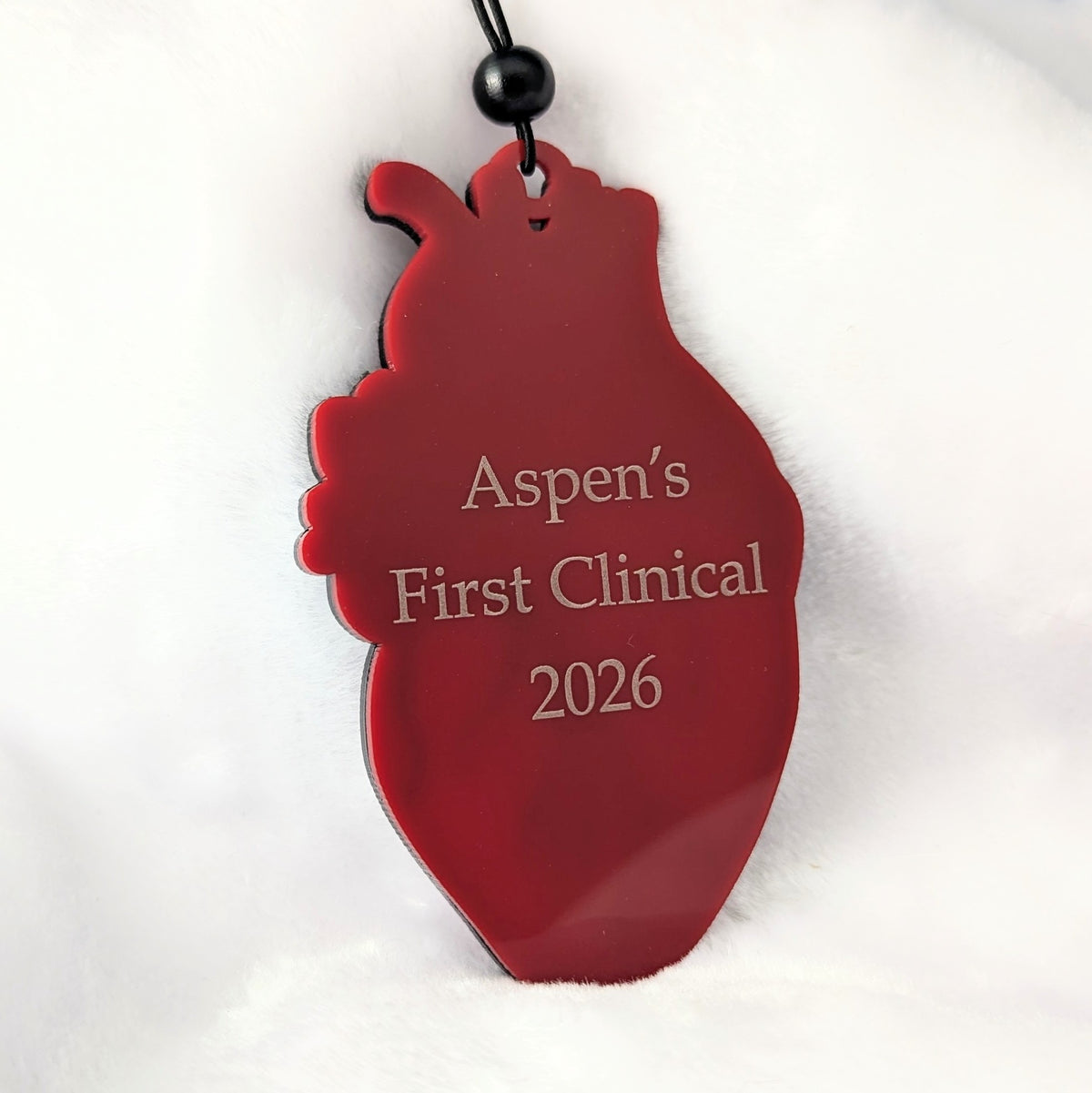 Back of anatomical heart ornament with custom engraving example